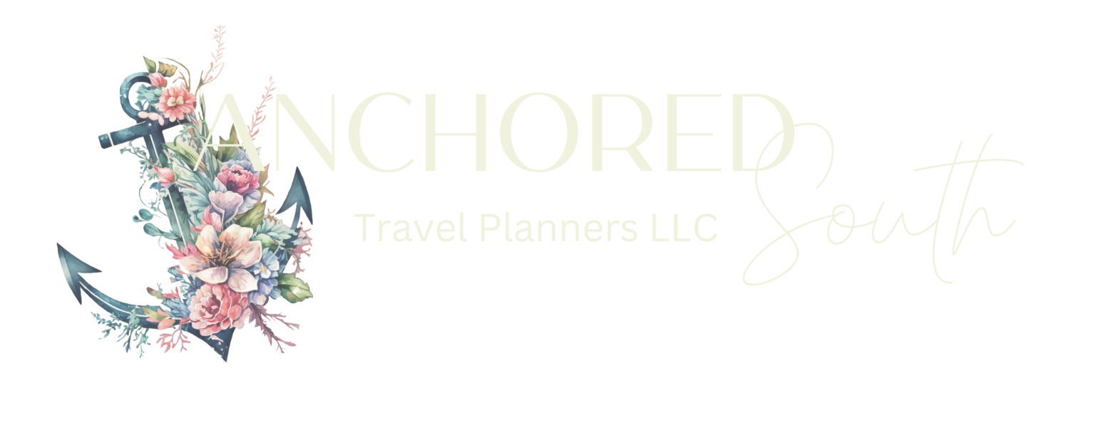 A blue anchor adorned with flowers for the logo of Anchored South Travel Planners destination wedding specialists